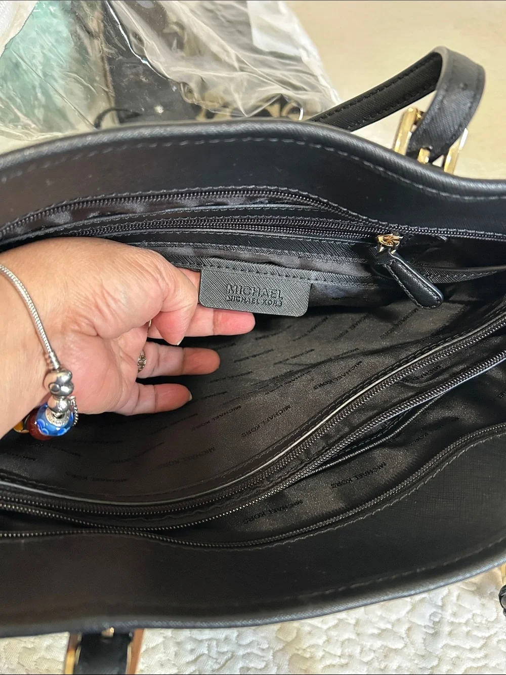 Michael Kors Black Saffiano Tote with MK Logo Charm